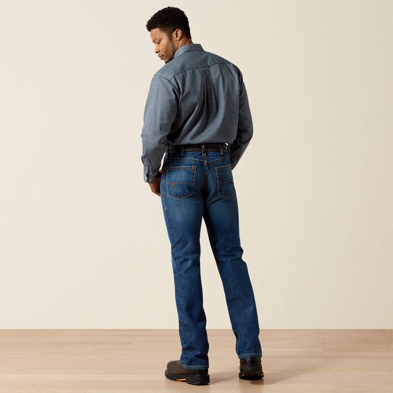 Men's Ariat Fr M4 relaxed fit boot cut jeans in a dark wash. Rear view