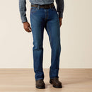 Men's Ariat Fr M4 relaxed fit boot cut jeans in a dark wash. Front View