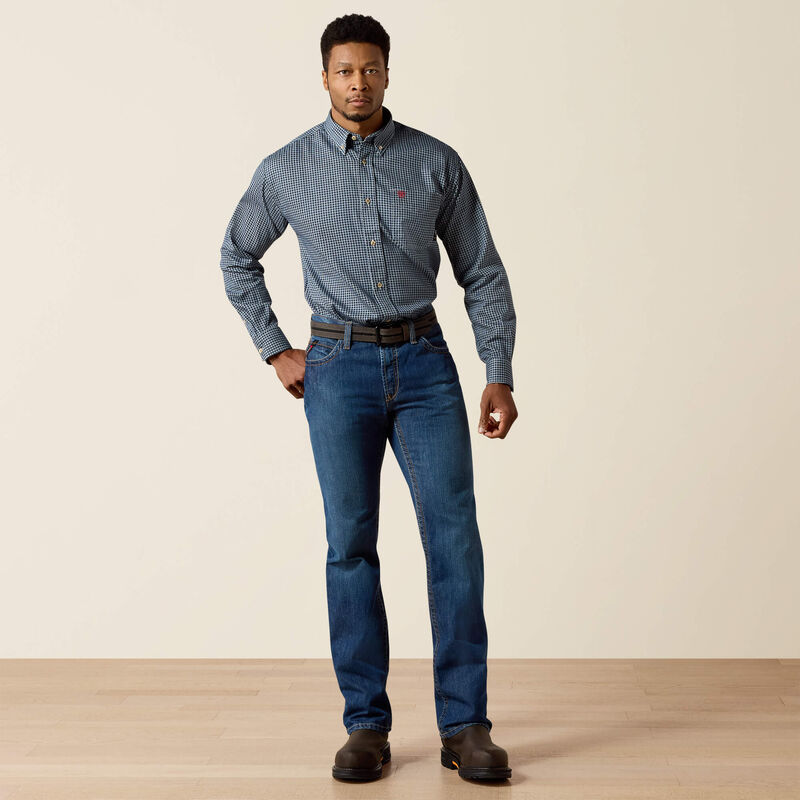 Men's Ariat Fr M4 relaxed fit boot cut jeans in a dark wash. Full front view showing jeans on model. 