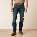 Men's Ariat Rebar straight leg work jeans in a dark wash. Front View