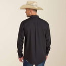 Men's Ariat long sleeve wrinkle free shirt in Black. Rear view showing shirt untucked. 