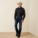 Men's Ariat long sleeve wrinkle free shirt in Black. Full front view showing shirt tucked in.