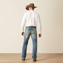 Men's Ariat M4 relaxed fit boot cut jean in a light wash. Rear view
