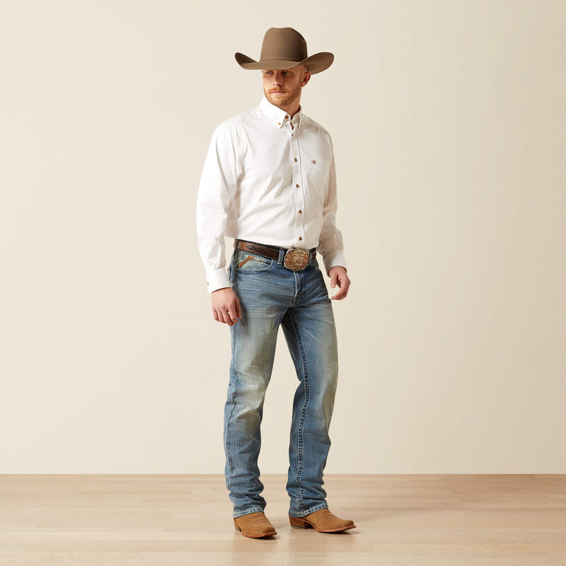 Men's Ariat M4 relaxed fit boot cut jean in a light wash. Full front view