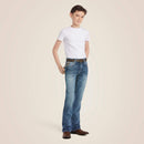 Boys Ariat B4 relaxed fit boot cut jeans in a medium wash. Full front view