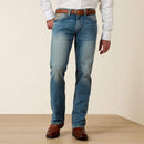 Men's Ariat M7 slim fit straight leg jeans in a light wash. Front View