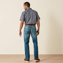 Men's Ariat M5 Rebar work jeans in Edgewood, a light wash. Rear view