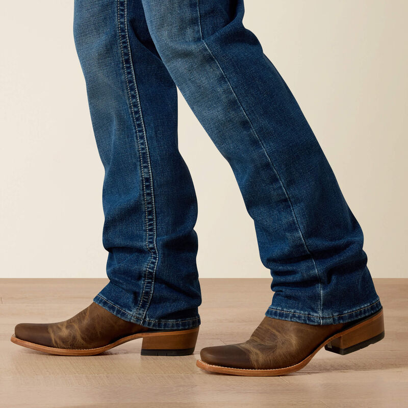 Men's Ariat Mc5 straight leg jeans. Close up of bottom of jeans. 