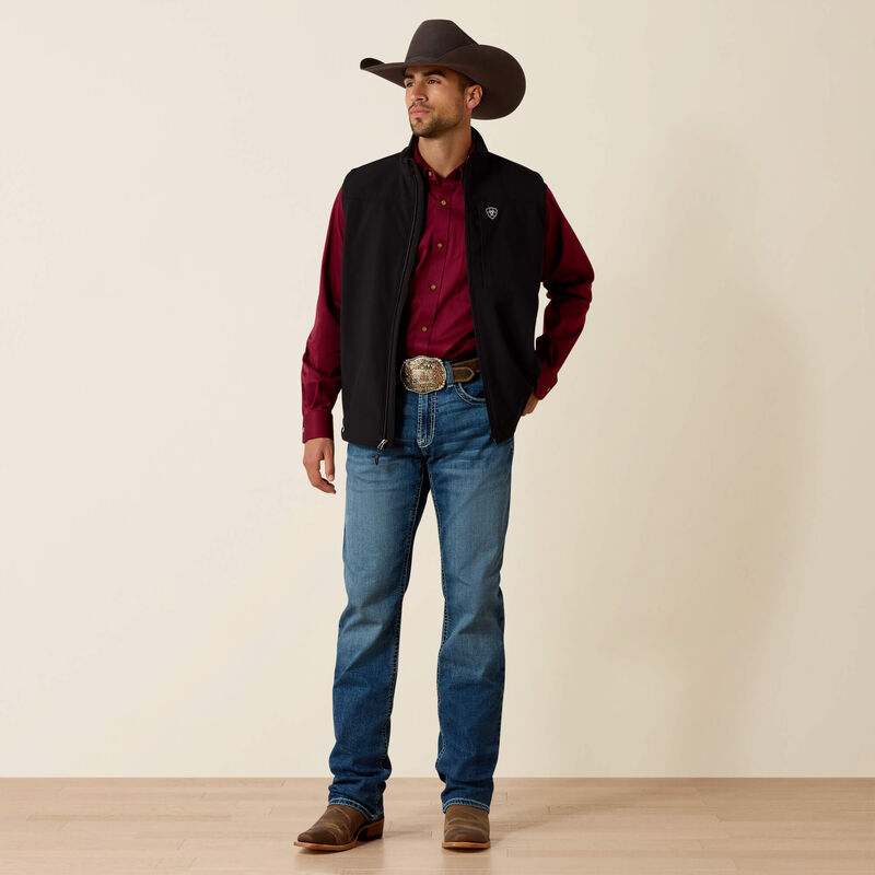 Men's Ariat M4 relaxed fit boot cut jean in a medium wash. Full front view 