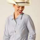 Women's Ariat long sleeve wrinkle resistant stretch shirt in True Blue. This Western style shirt is a blue and white pinstripe. Close up of Ariat shield logo stitched on left chest pocket. 