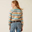 Girl's Ariat blue and brown Serape Print long sleeve Team logo shirt. Rear view showing shirt tucked in.