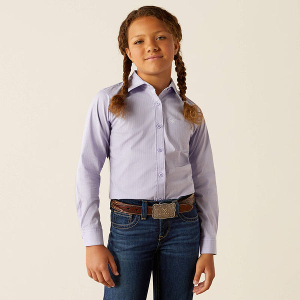 Girls Ariat Long Sleeve shirt in Sweet Lavender Stripe. This shirt has stretch and is wrinkle resistant. Front view showing shirt tucked in. 