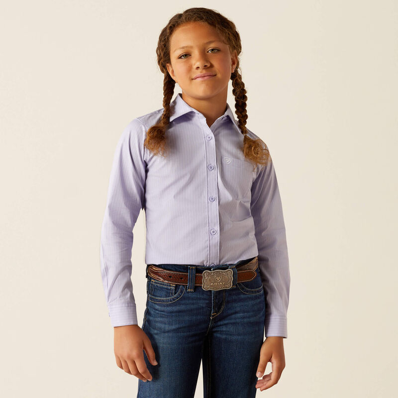 Girls Ariat Long Sleeve shirt in Sweet Lavender Stripe. This shirt has stretch and is wrinkle resistant. Front view showing shirt tucked in. 