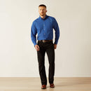Men's Ariat long sleeve wrinkle free shirt in Navy. Full front view showing shirt tucked in.