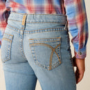 Ariat girls boot cut jean, in a light wash. Rear view showing back pocket stitching and Ariat logo on back belt loop. 