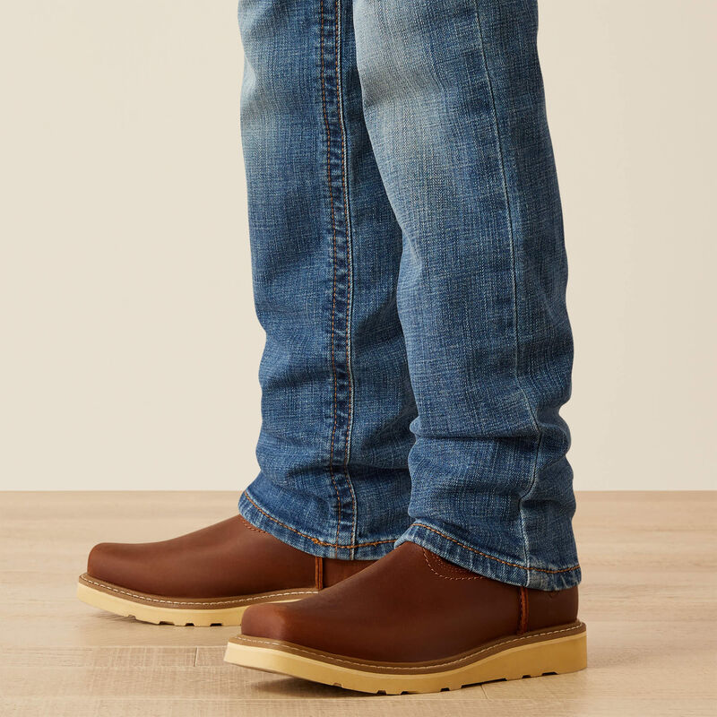 Boy's Ariat B5 slim straight jean. Close up of bottom of jeans. 
