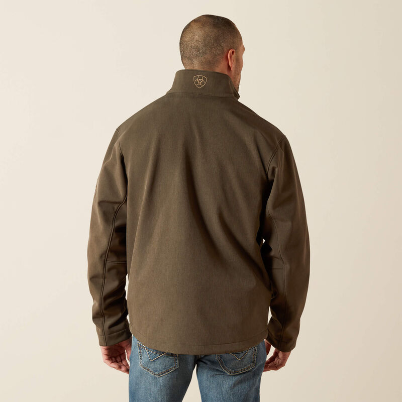 Ariat men's softshell jacket in Earth Green Heather. This jacket features a bold Ariat logo on the left sleeve in brown. Back view showing the Ariat shield logo on back collar. 
