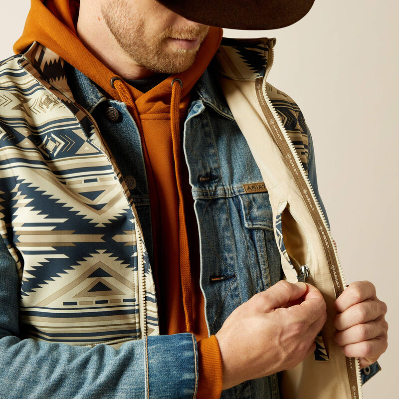 Closeup view of men's Ariat weather resistant vest front. Show standing collar, lined full front zipper, inside left chest zippered pocket.