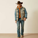 Men's Ariat aztec print weather resistant vest. Has full front zipper, standing collar, left chest vertical zippered phone pocket with an Ariat logo, slash zippered hand pockets. Hits mid hip. Full front view.