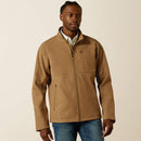 Men's Ariat khaki jacket with full front zipper with wind stop lining, left chest Ariat logo, zippered hand pockets, and standing collar. Shows solid yoke and chest with tonal geometric lower body and sleeves. Hits upper thigh. Front view.