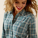 Women's Ariat Aquamarine Dobby plaid long sleeve button up shirt. Close up of chest pockets featuring a stitched Ariat logo.