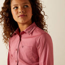Girls Ariat long sleeve logo shirt in Mauvewood. Close up of the collar showing Ariat logo and Ariat shield logo on chest pocket. 