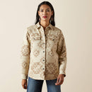 Women's Ariat cotton shirt jacket with front chest patch pockets closed with buttoned top flaps. Shows front button closure, front shoulder yokes, welted slash hand pockets, Ariat logo leather label at bottom of front placket, curved hem. Front view.