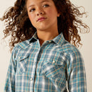 Girl's Ariat long sleeve pearl snap shirt in Aquamarine Plaid. Front view showing shirt untucked. Close up of collar and front pockets. 