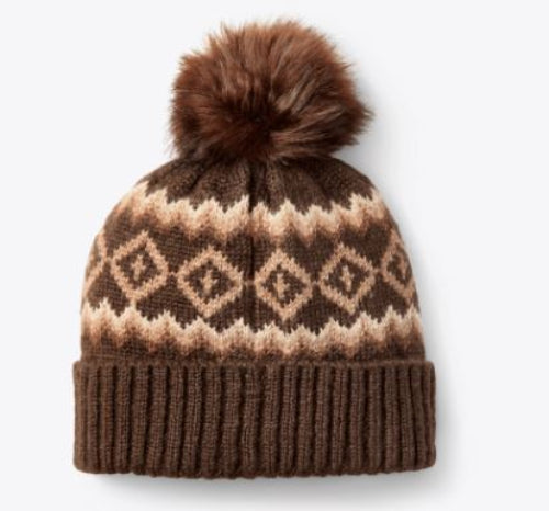 Brown knitted beanie with a patterned design and fur pom-pom.