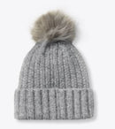 Heather Gray knit beanie with a fur pom-pom