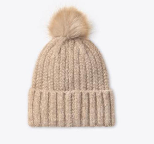 Beige knit beanie with a fur pom-pom
