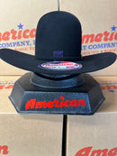 Front view open crown black felt cowboy hat.