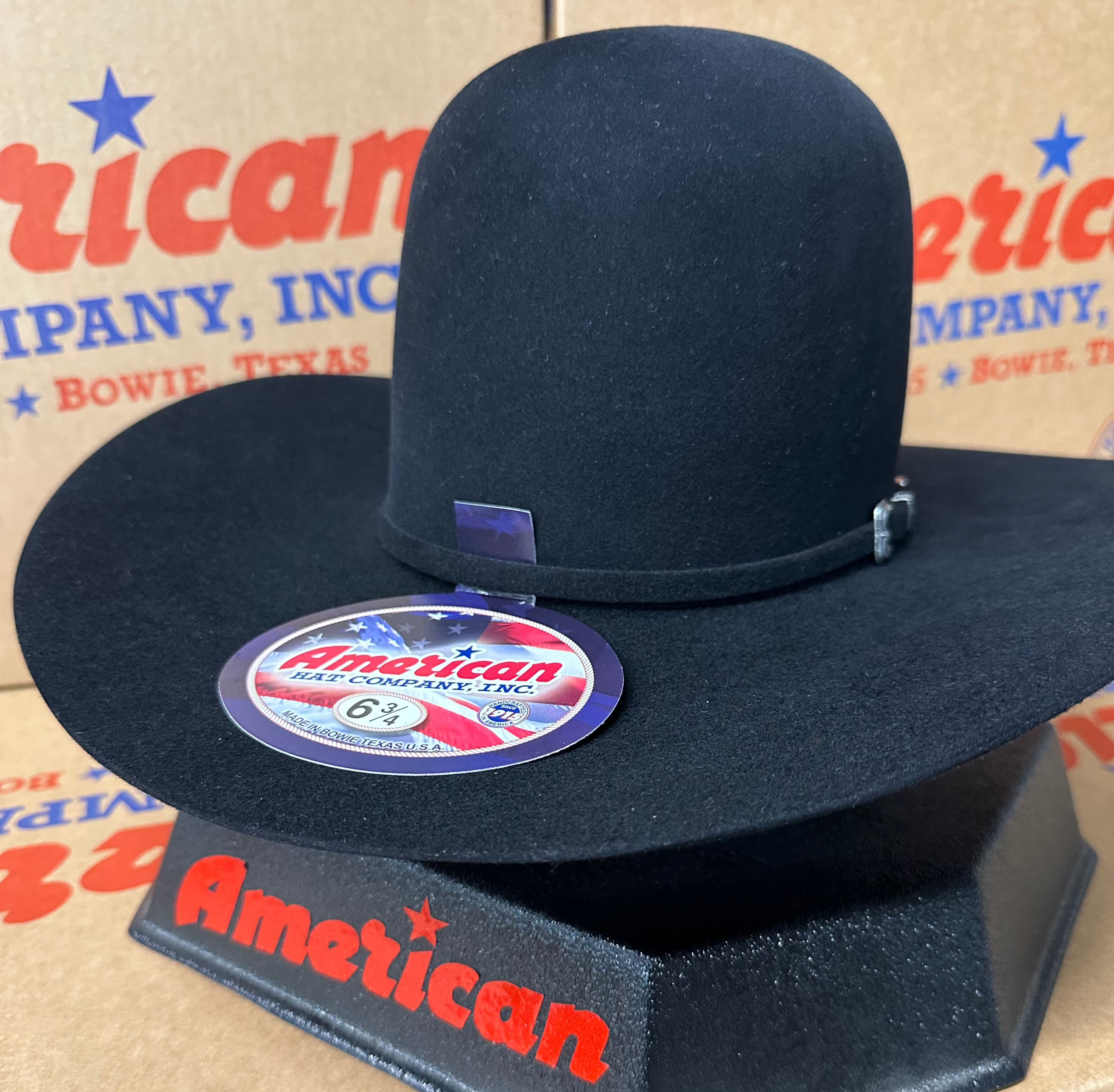 Black open crown felt hat by American Hat Company.