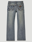 Back view of a pair of Wrangler Retro® slim fit straight leg jeans for boys with a low-rise waist and a bootcut leg.