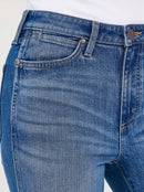 Close-up of Women's Bailey Retro bootcut jeans in Josephine blue wash with a coin and scoop right pocket . Also shows rivets on pocket tops and detail of front button and zipper closure.