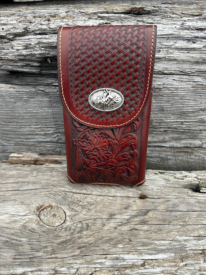 Brown embossed leather phone case with a Bull Rider Concho, has leather belt loop attachment. Front View