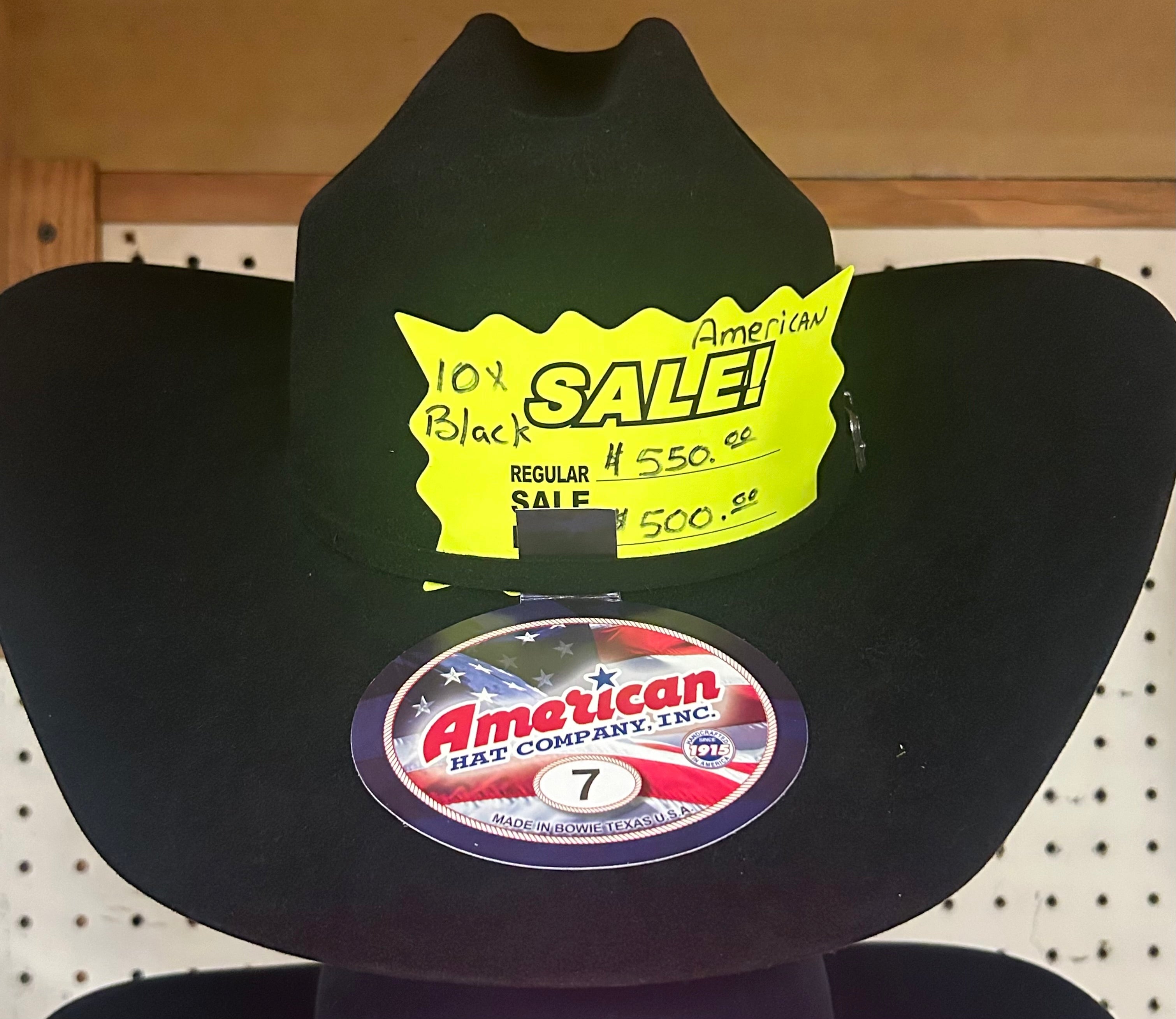 A black American Hat Company rancher crease crown and brim shape felt hat.