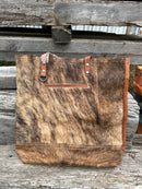 Brown leather and cowhide tote bag. Close Up Front A