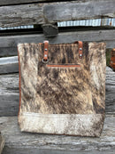 Brown leather and cowhide tote bag. Close Up Front B