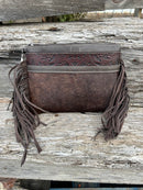 Coffee Brown embossed leather and cowhide crossbody bag with fringe sides. Front View A