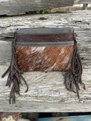 Coffee Brown embossed leather and cowhide crossbody bag with fringe sides. Front View G