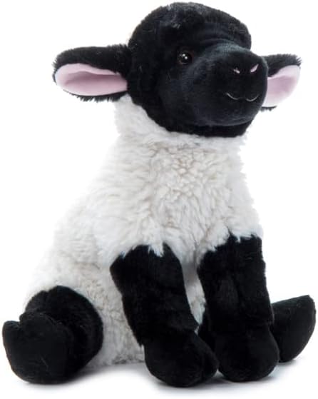 A plush toy resembling a white and black sheep with pink inner ears, sitting upright.