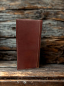 Tall leather wallet with a embossed Praying Cowboy design.  Rear View