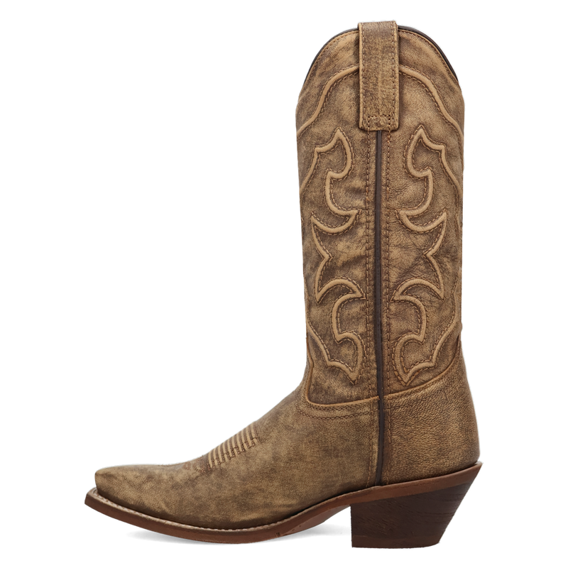 A instep side view of a brown cowboy boot with intricate corded stitching.