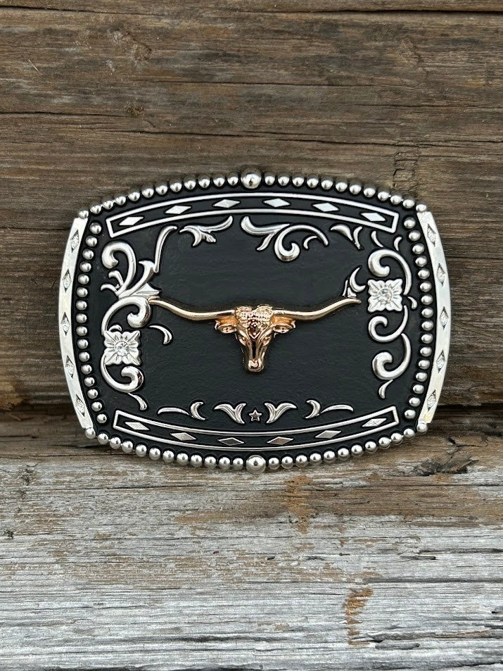 This matte black buckle features a Longhorn design with a intricate Silver border.  Front View
