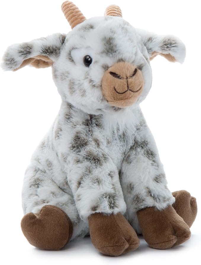 A plush toy resembling a white spotted goat with multicolored patterns, extended ears and horns, and a big smile. It has short legs, playful eyes, and small brown feet.