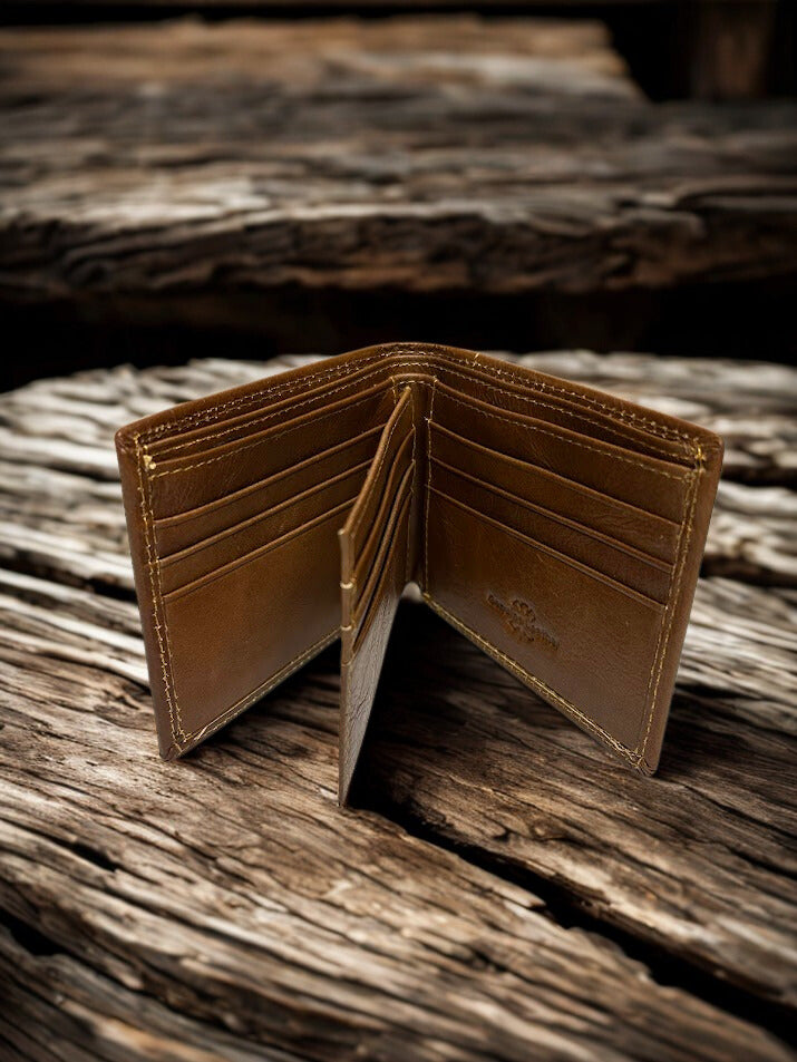 Inside view of a Brown leather wallet on a wooden surface