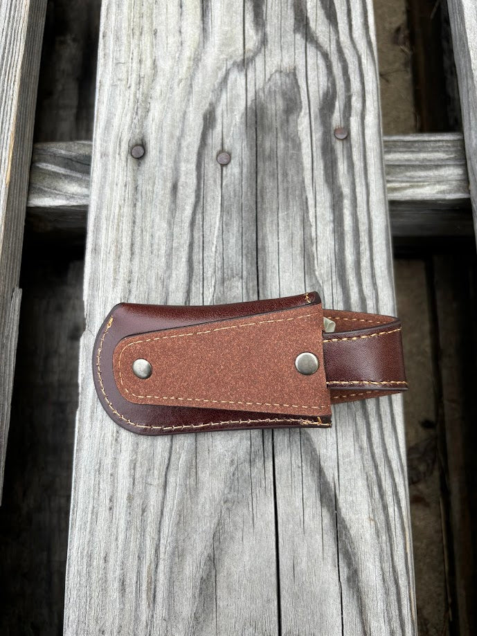A Coffee Brown leather knife sheath with a decorative longhorn and star design. Rear view showing leather belt attachment. 