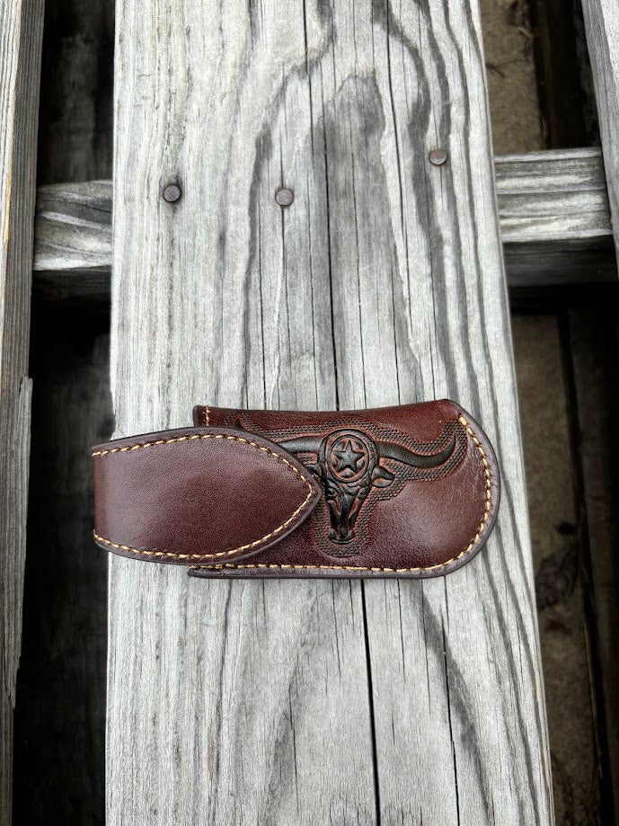 A Coffee Brown leather knife sheath with a decorative longhorn and star design. Front View