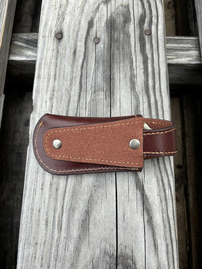 Praying Cowboy design knife sheath with keep in Coffee Brown. Rear view showing belt loop. 